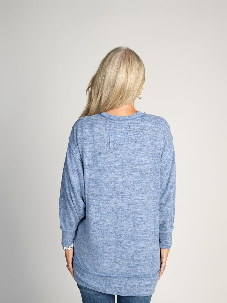Long Sleeve Top With Exposed Hem Details