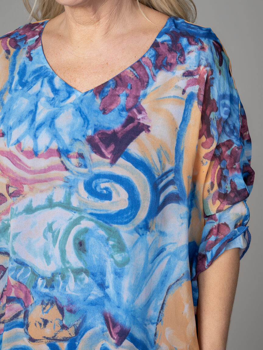 Asymetric Poncho With Sleeveless Top