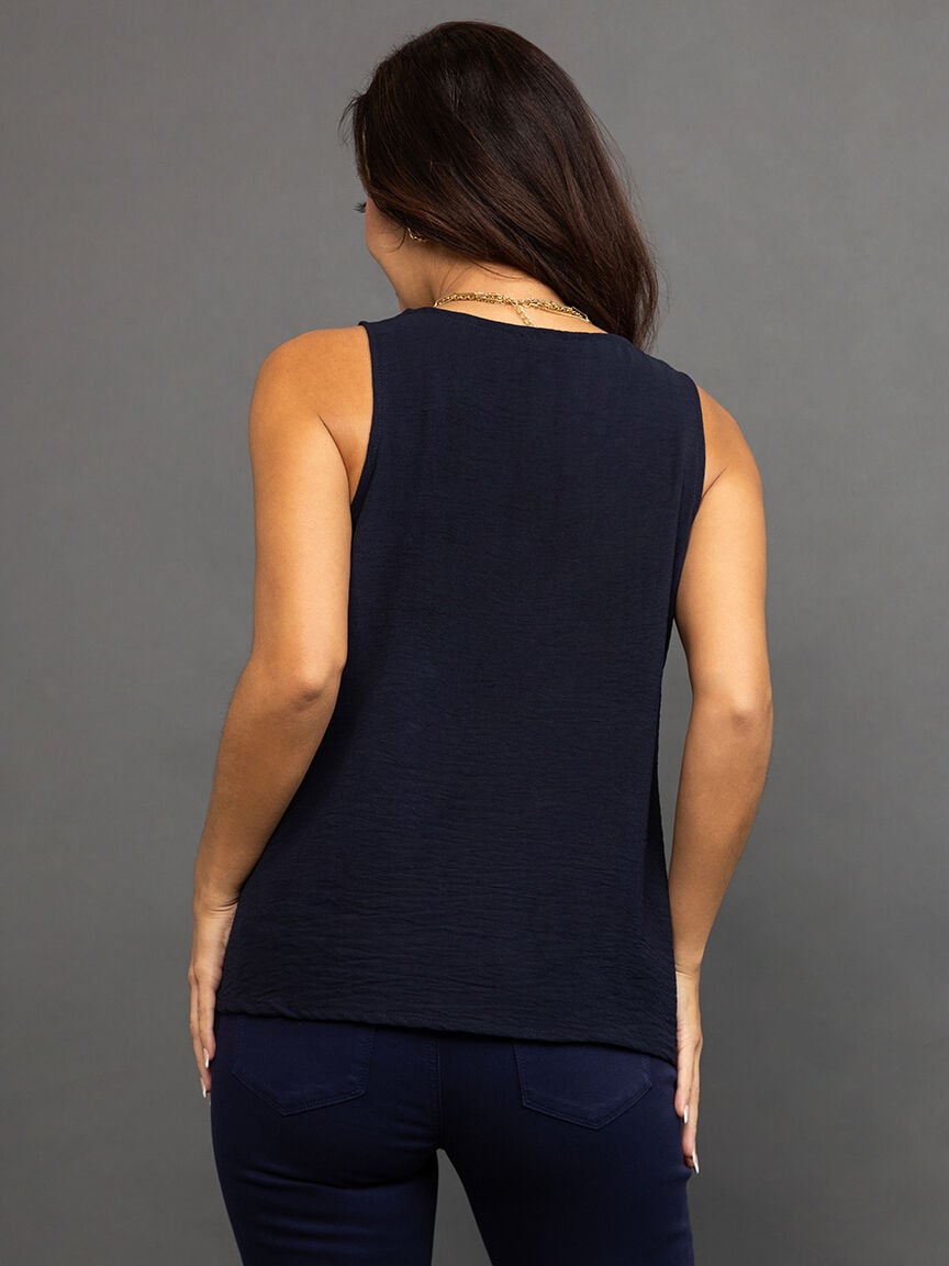 Sleeveless top with pleat detail
