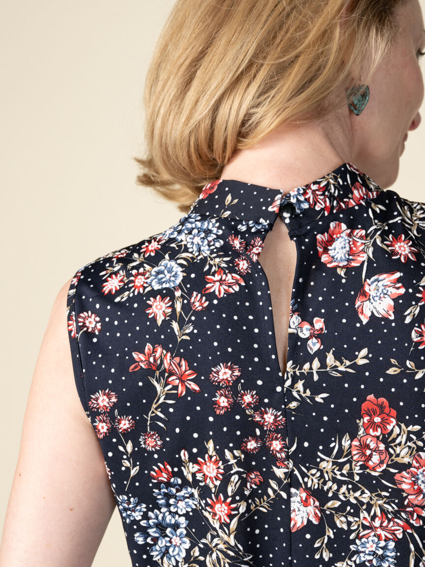 Sleeveless V Neck Top with a Bow Knot