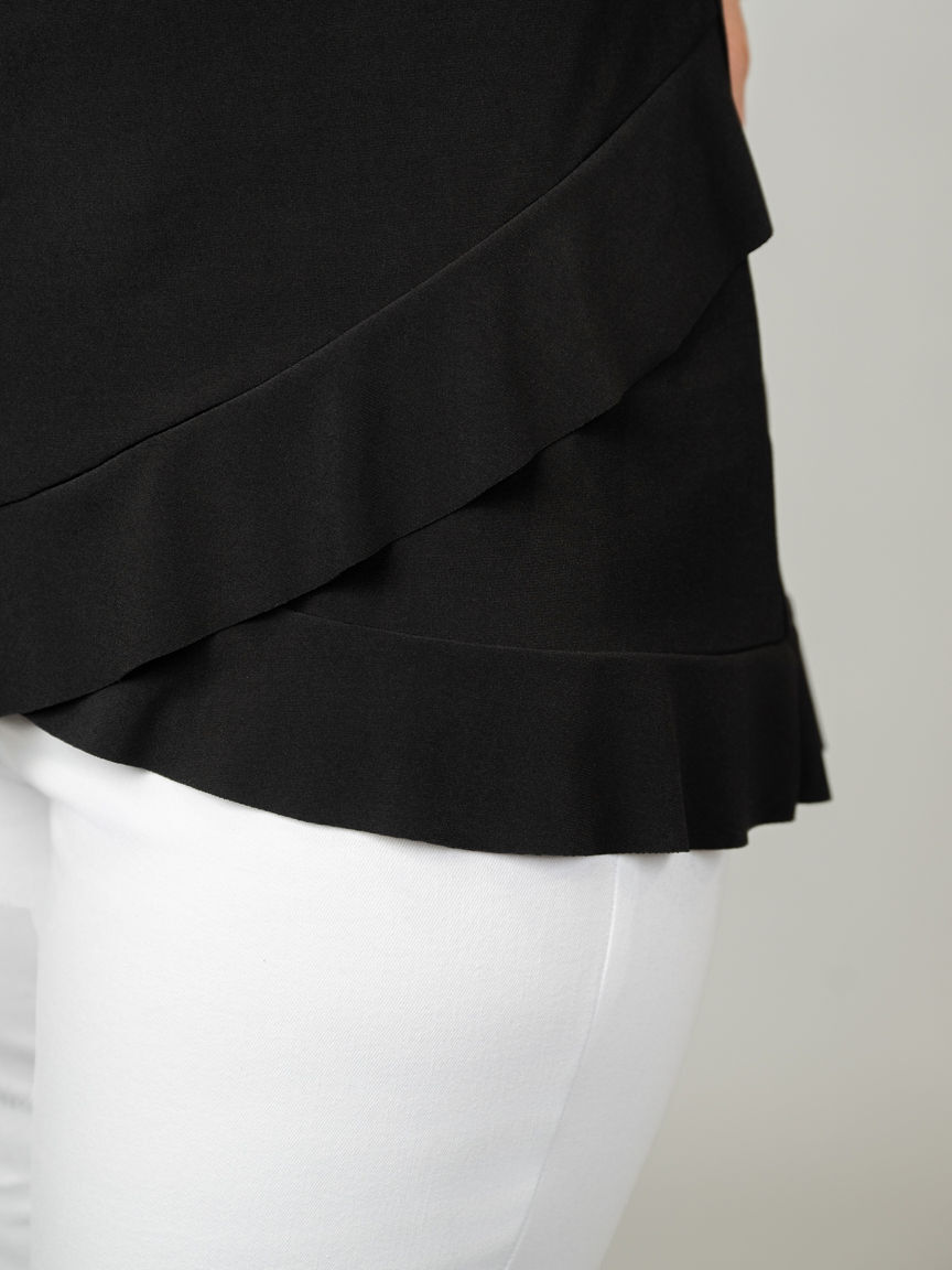 Sleeveless Top With Ruffled Hem