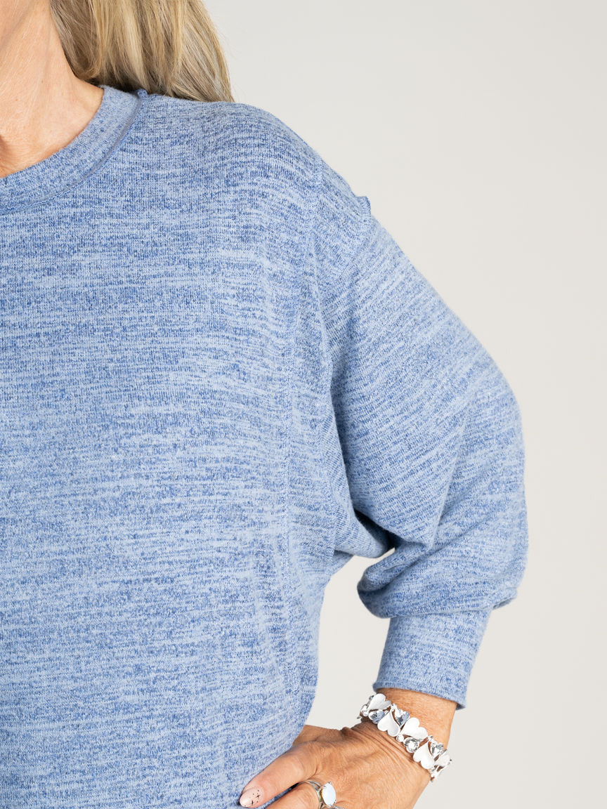 Long Sleeve Top With Exposed Hem Details