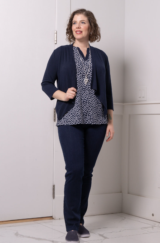 Notched V-Neck Sleeveless Polka Dot Top Image 1