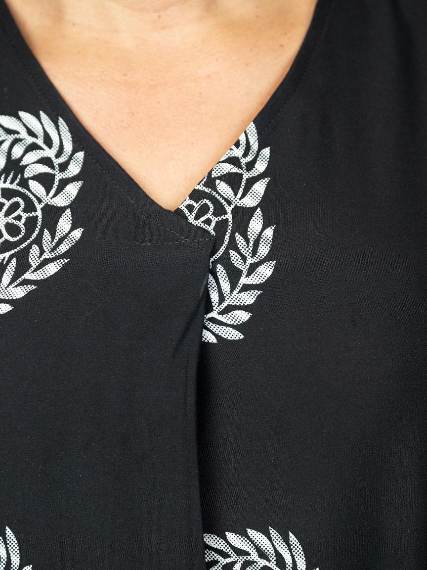 Sleeveless Flowy V-Neck Top