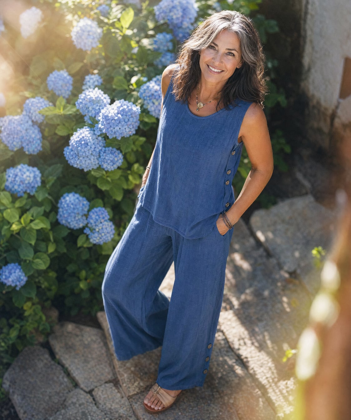 image of a women matching blue top and pant set