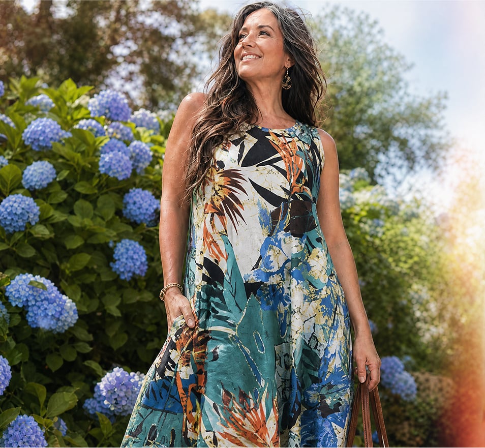 Woman smiling wearing flowy dress