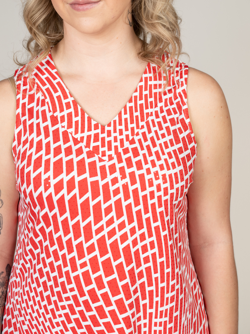 Sleeveless V-Neck Top With Asymmetrical Hem | Studio 65 | Suzanne's